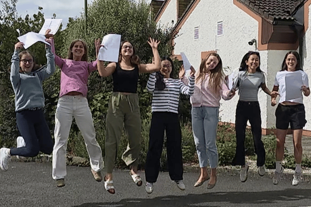 Aoife Egan, Lucy Fitzgearld, Sinead Gleeson, Jiani Guinan, Gillian Hayden, Sarah Grimes and Caoimhe Spain jumping for joy after receiving their Leaving Cert results at Coláiste Naomh Cormac.