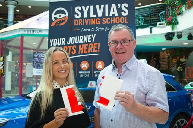 Sylvia Molloy with Cllr Sean O'Brien at the launch of the new driving school