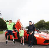 Irish Formula 2 racing driver Alex Dunne pictured with Phoebe Quail (7) and Jimmie Quail (10) at the announcement that Ronald McDonald House will be the official charity partner 