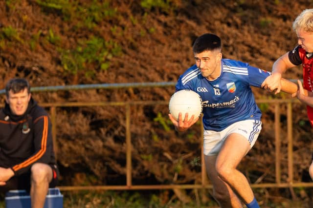 Tullamore’s Peter Fox and Tubber’s Padraig McLoughlin in the SFC “B” a couple of weeks ago with 50 year old Ciaran McManus watching on - McLoughlin went off injured with a bad shoulder injury soon afterwards while McManus came on in the closing quarter and is likely to feature against Ballinagar on Saturday.
