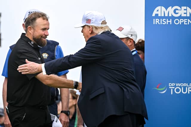 U.S. President Donald Trump, right, shakes hands with Shane Lowry of Ireland during day four of the Amgen Irish Open Golf Championship 2026 at Trump International Golf Links in Doonbeg, Clare. Photo by Brendan Moran/Sportsfile
