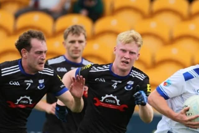 Luke Plunkett gets away from Killian Owens and Jack Kennt