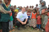 Ronan Scully of Self Help Africa visiting some of the beneficiaries of the work of Self Help Africa supported by Irish Aid in Debra Berhan displaced peoples camp in Northern Ethiopia