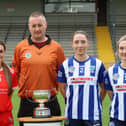 Senior A Captains Sharon Shanahan, Shinrone, Rachel Brennan and Cailin Fitzgerald, St Cillian's with referee Shane Guinan