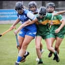 Orla Gorman (Tullamore) and Josie Gleeson (Kilcormac/Killoughey) battle for the ball in the Offaly Senior B camogie final.