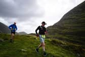​George Webb (left) and John Bulfin crossing the magnificent pass at the head of the remote Black Valley on the Kerry Way. A 200 kilometre run through the mountains of Kerry is one of the most daunting challenges imaginable.