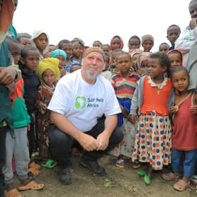 Ronan Scully of Self Help Africa visiting some of the beneficiaries of the work of Self Help Africa supported by Irish Aid in Debra Berhan displaced peoples camp in Northern Ethiopia