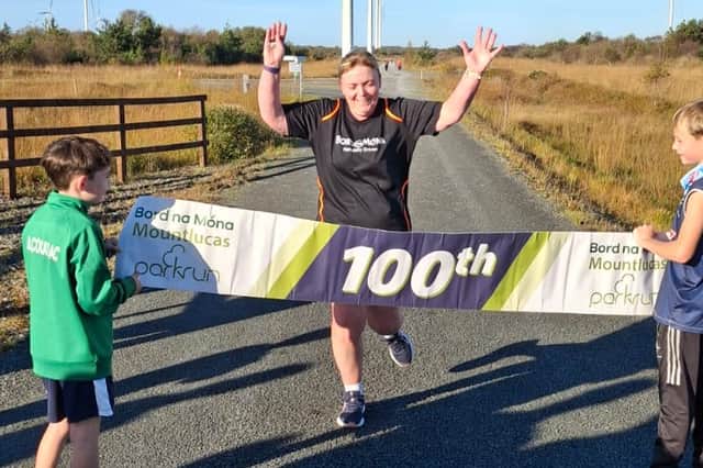 Laura completes her 100th parkrun