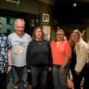 Kevin Byrne with two of the winning team Michael Cushin and Greta Cushin at Kinnitty Players quiz alongside Lorraine Scully, Lorraine Delaney and Louise Makim.