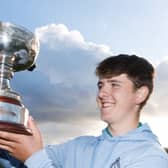 Eanna Mulhare proudly displays the trophy