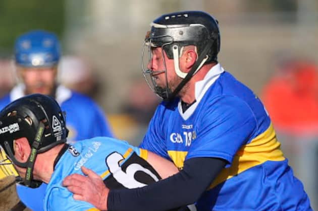 Pauric Horan is tackled by James Sullivan