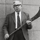 Harry Fennell, holding the Shinrone Hurl made by his father Martin for his teammate Bill Barry. The Hurl will once again take to the field at the community fundraiser walk on Sunday 1st November