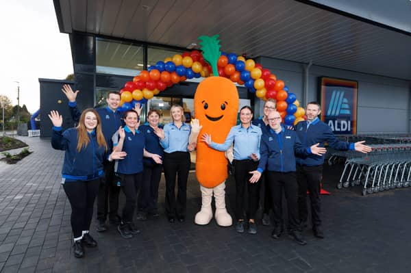 Pictured (L-R) at the opening of ALDI's new store in Moate are  Fiona Smith, ALDI Moate Store Manager with her store team and Kevin the Carrot. The new €8 million store will create 30 new permanent local jobs. It is ALDI’s 168th store in Ireland and fifth in County Westmeath. Picture Conor McCabe Photography.