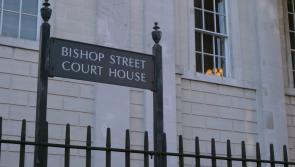 Man filmed waving machete and chasing two other men in Derry appears in court