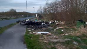 Remains of burnt out caravan left on footpath in Edenderry