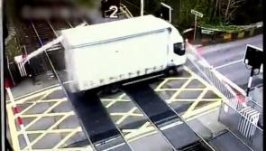 WATCH: Irish Rail shares shocking footage of lorry ploughing through level crossing barrier