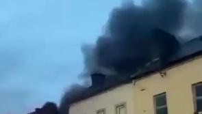 WATCH: Plumes of black smoke hang over Tullamore as fire raged at derelict former supermarket