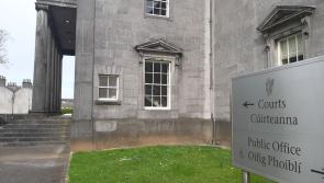 Smashed window and door of Offaly bookmaker
