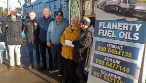 Winner of big jackpot in Offaly club's Lotto draw picks up her cheque