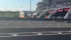 'The whole yoke is on fire' - Watch as serious fire blazes at toll booth in the Midlands