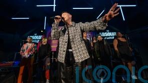 Olly Alexander performs with choir celebrating diversity