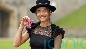 Emma Raducanu collects her MBE wearing Dior