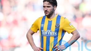 Luke Leahy stays cool from the spot to help Shrewsbury to victory