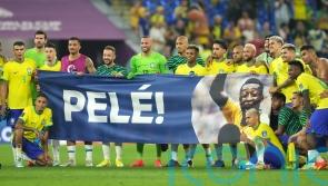 Brazil players display banner in support of Pele after seeing off South Korea