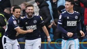 Tom Bradshaw’s double against Rotherham lifts Millwall into play-off places