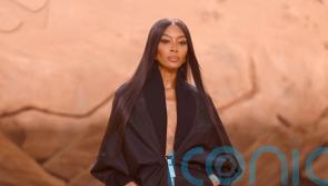 Naomi Campbell takes to the runway at Paris Fashion Week