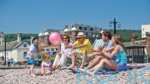 Intergenerational holidays popular as living costs squeeze budgets, survey finds
