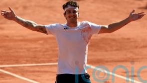 French Open day three: Seyboth Wild springs shock as Swiatek powers through
