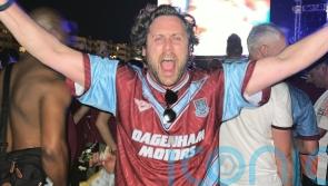 West Ham fan parties with players outside hotel to celebrate club’s victory