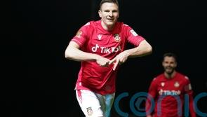 Rob Page says Wrexham’s Paul Mullin must prove himself in EFL to earn Wales call