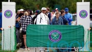 Wimbledon queue grows longer on third day as weather brightens