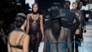 Naomi Campbell wears black lingerie on Dolce and Gabbana catwalk