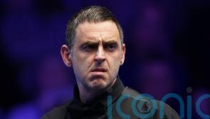 Ronnie O’Sullivan wins World Grand Prix opener as Ali Carter feud continues