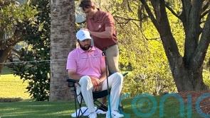 Scottie Scheffler plays through pain barrier to keep defence alive at Sawgrass