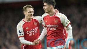 Title-chasing Arsenal go top after seeing off struggling Luton