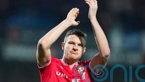 Wrexham striker Paul Mullin set to miss start of season after spinal surgery