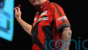 James Wade brings early end to Nathan Aspinall’s title defence