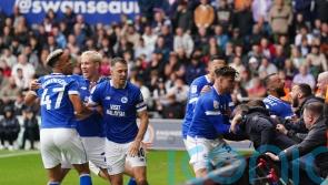 Callum Robinson’s late equaliser earns Cardiff a point in derby at Swansea