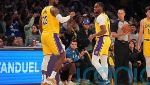 LeBron James makes history alongside son in NBA season opener