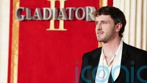 Paul Mescal sports his suave 70s style alongside King at Gladiator 2 premiere