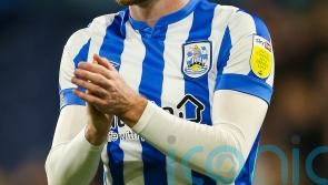 Ollie Turton’s strike enough for Huddersfield to see off Wigan