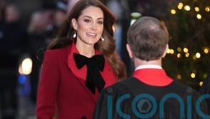 Kate sports festive bow ensemble at Christmas carol service
