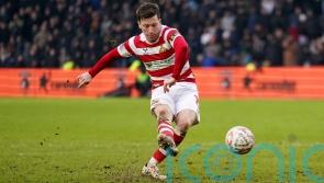 Doncaster boost bid for automatic promotion with narrow win at Accrington