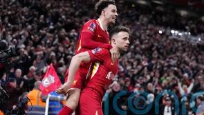 Diogo Jota fires leaders Liverpool to victory in controversial Merseyside derby