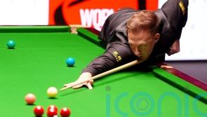 Judd Trump breaks century record in Crucible quarter-final win over Luca Brecel
