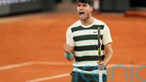Carlos Alcaraz to defend French Open title in final as Lorenzo Musetti retires